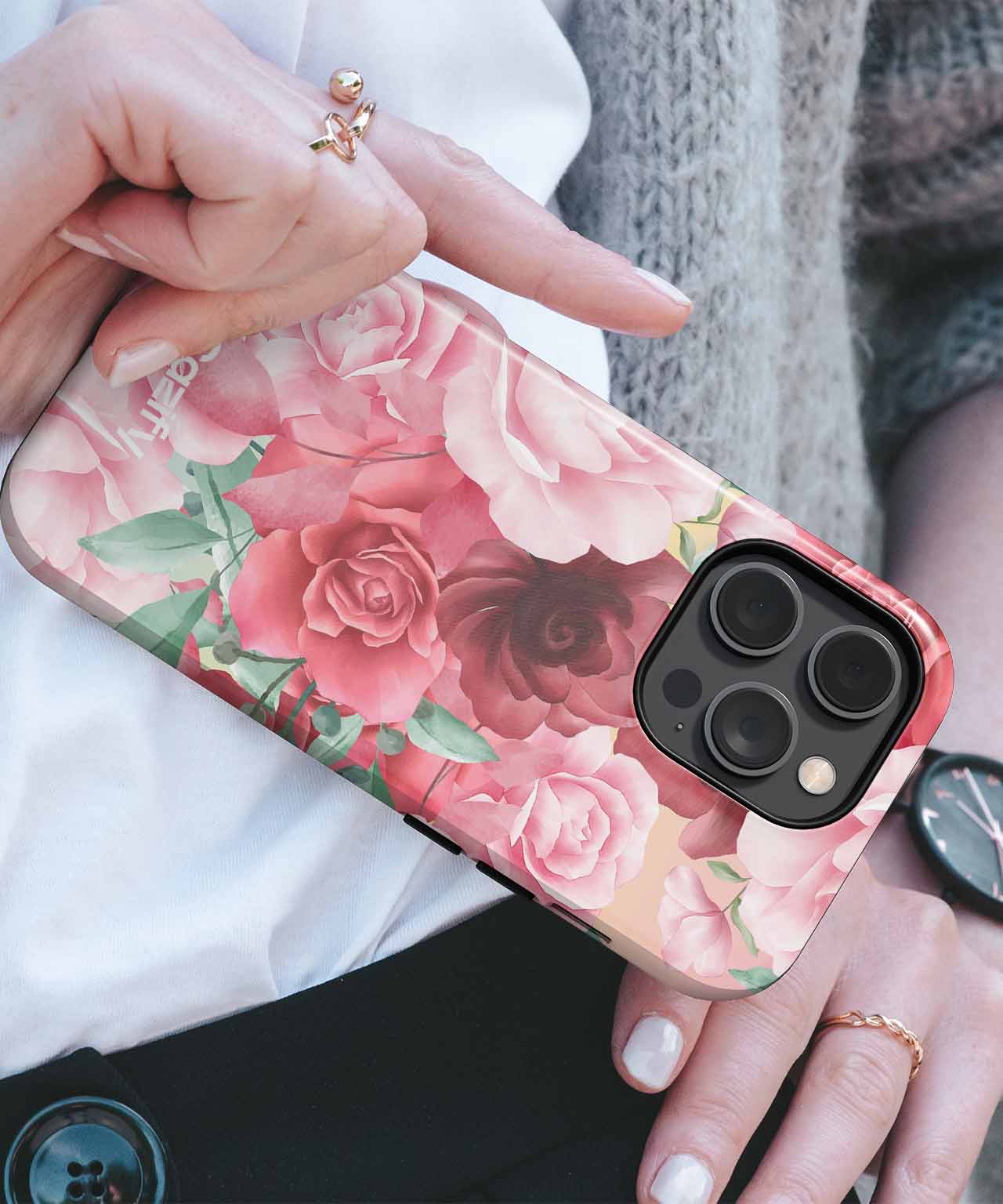 Pink floral iPhone case with large camera cutout and gold accents on hand. - Blooming Delightful Rose Garden iPhone case - Cazify Canada