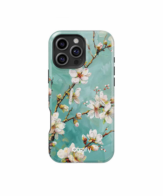 Green iPhone case with white cherry blossom branch design and protective corners. - Blossoming Joyful Beauty in Spring iPhone case - Cazify Canada