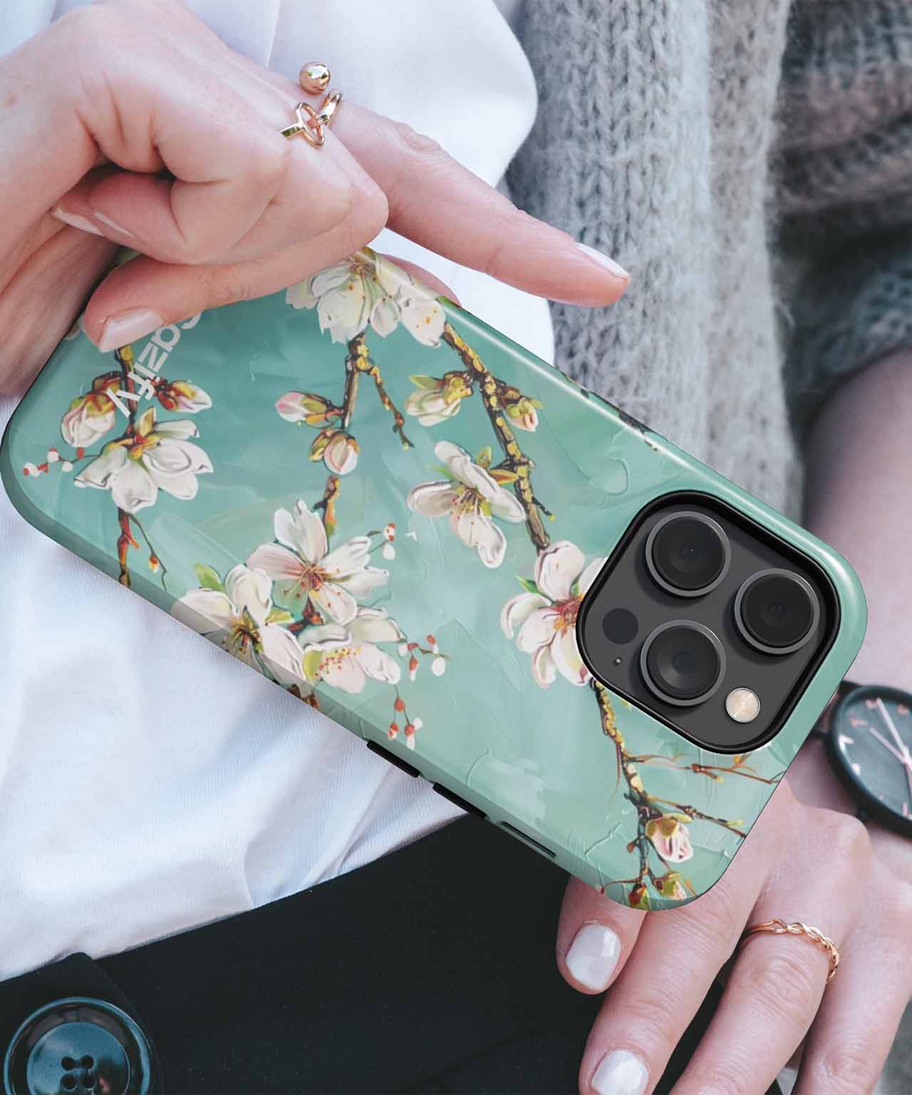 Green iPhone case with white cherry blossom design and gold accents. - Blossoming Joyful Beauty in Spring iPhone case - Cazify Canada