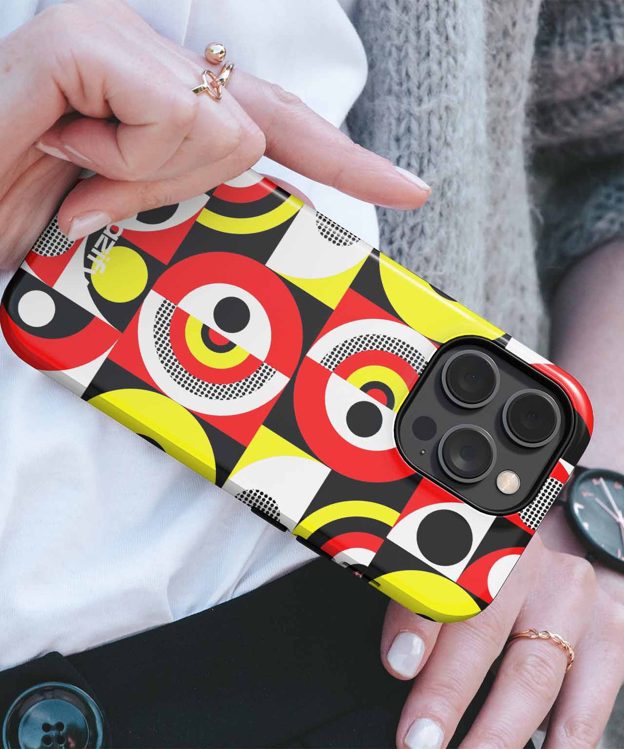 Colorful geometric abstract pattern iPhone case with red, yellow, black, and white circles. - Cazify Canada