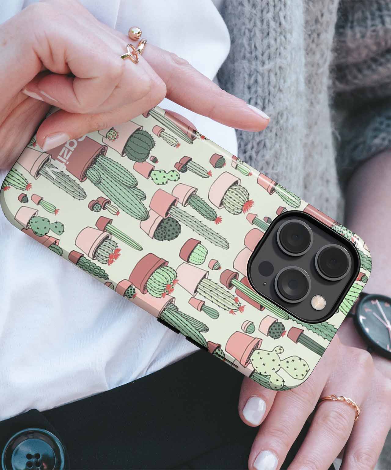 Green cactus patterned protective phone case on black iPhone with triple camera lenses. - Cazify Canada