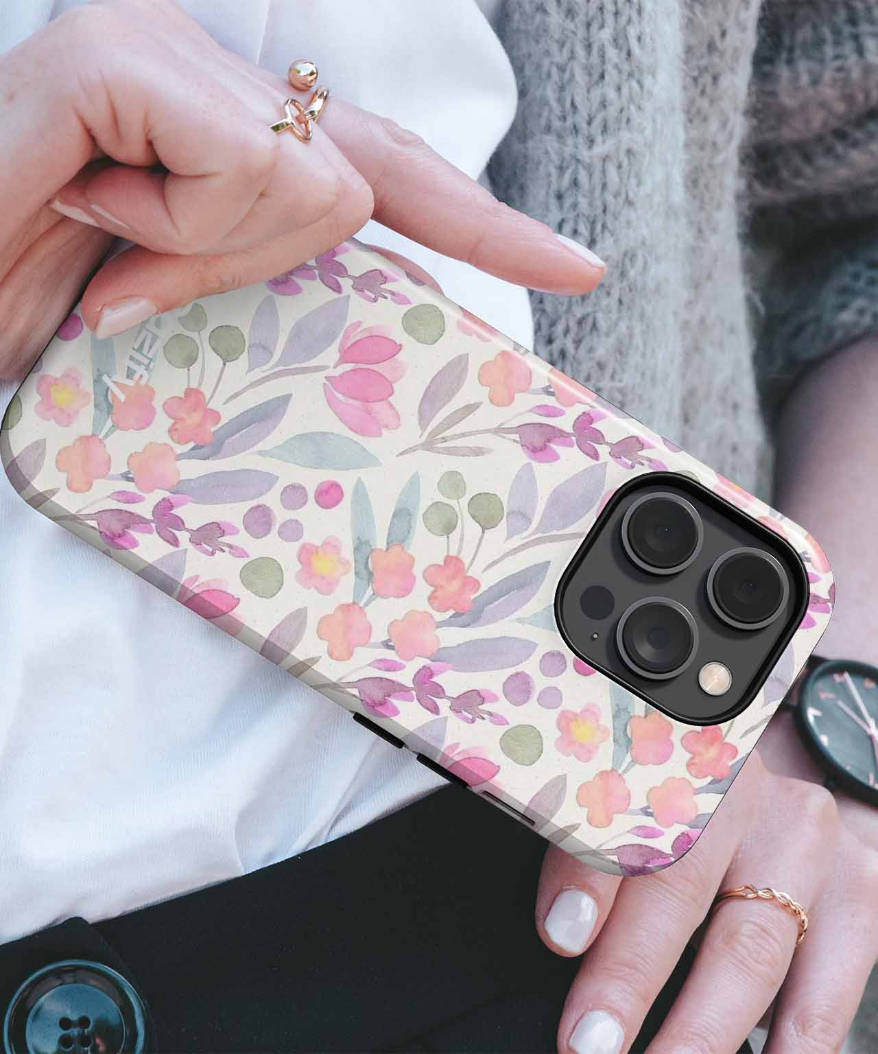 Floral print iPhone case with pink, purple, and orange flowers on a cream background. - Cazify Canada