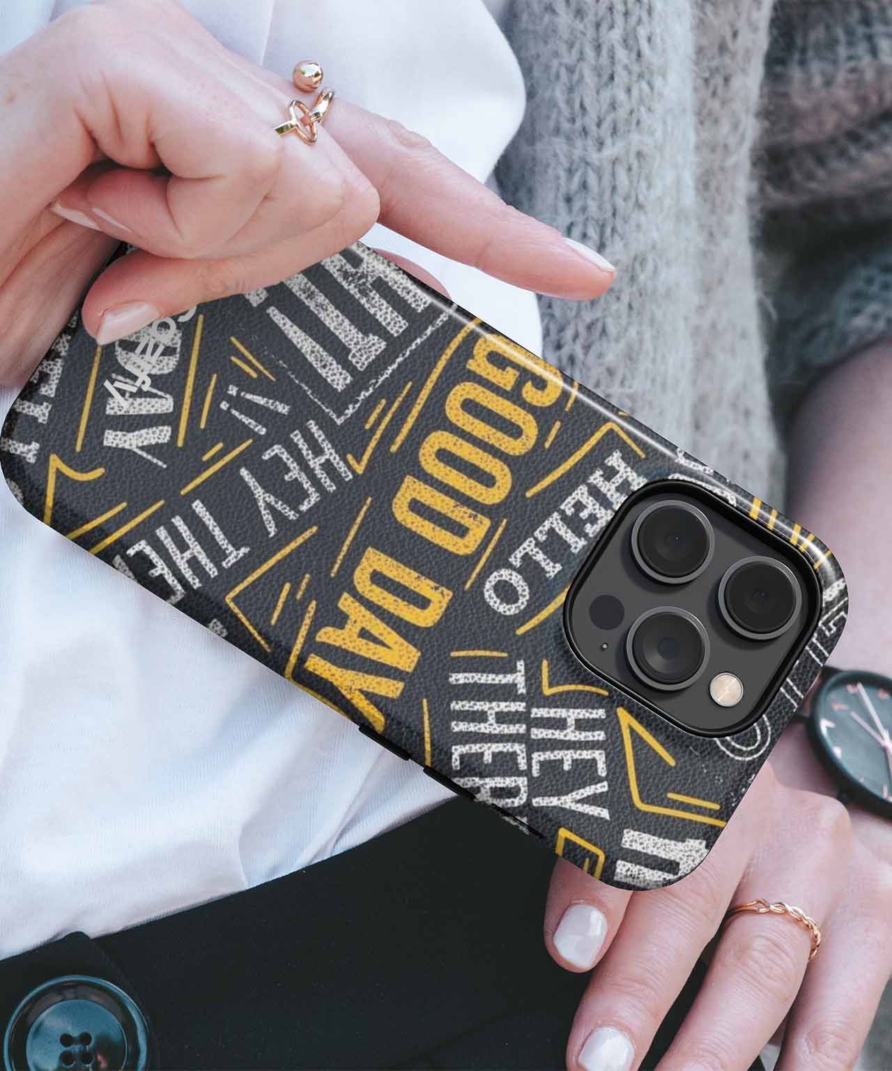 Black iPhone case with yellow and white bold text saying hello, good day, and hey there. - Cazify Canada