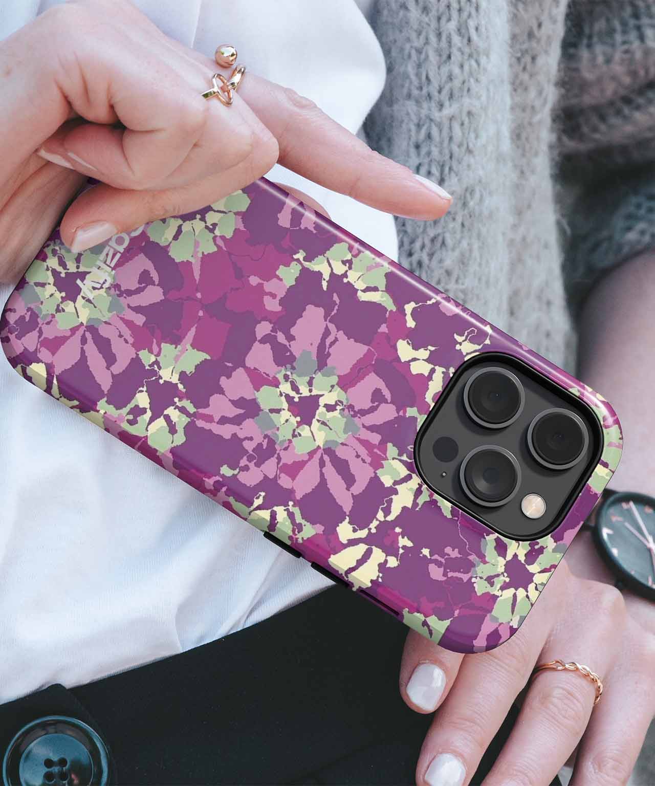 Purple floral patterned phone case on smartphone with triple camera lenses. - Cazify Canada