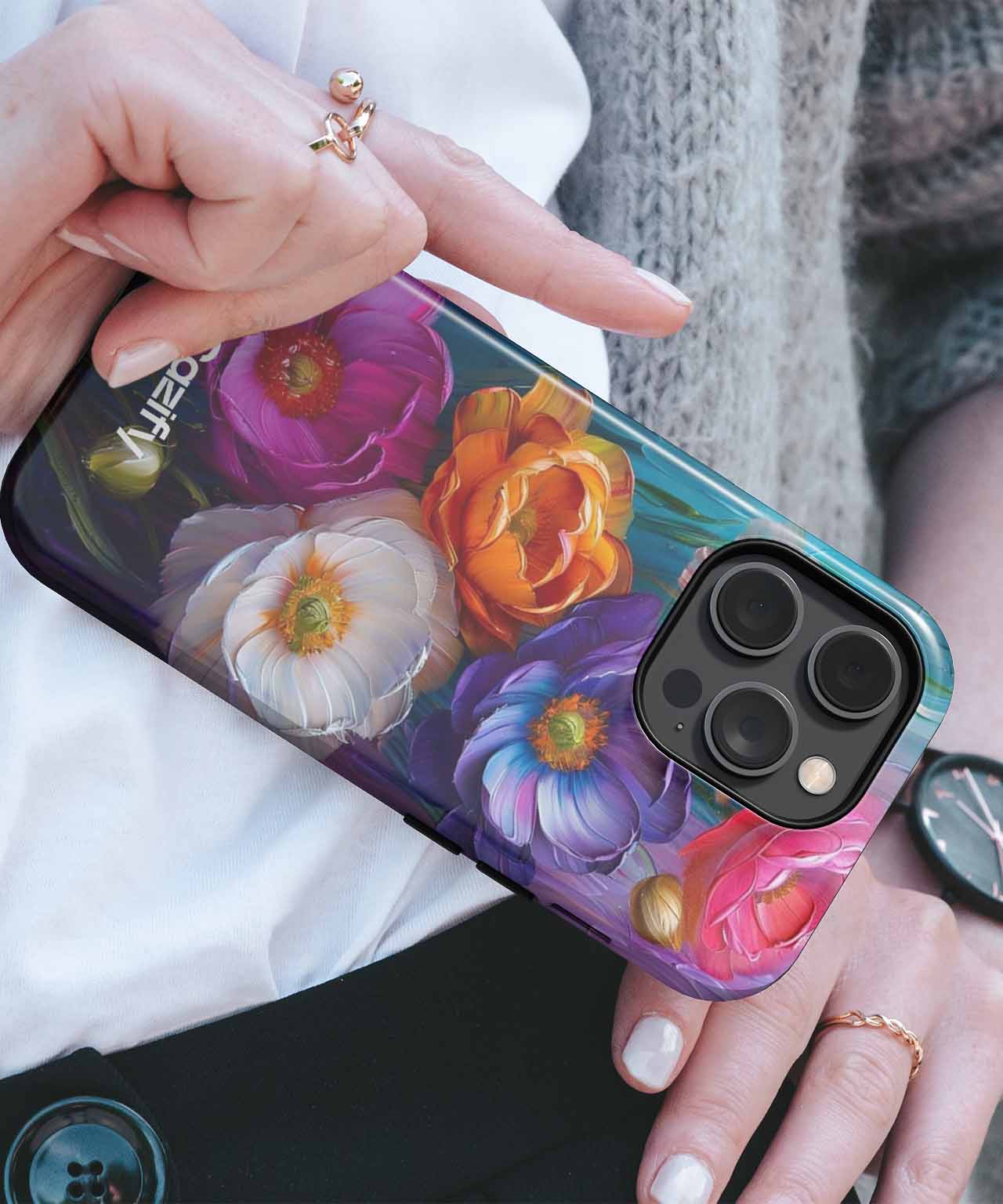 Colorful floral design iPhone case on black background with glossy finish. - Colorful Floral Explosion of Happiness iPhone case - Cazify Canada