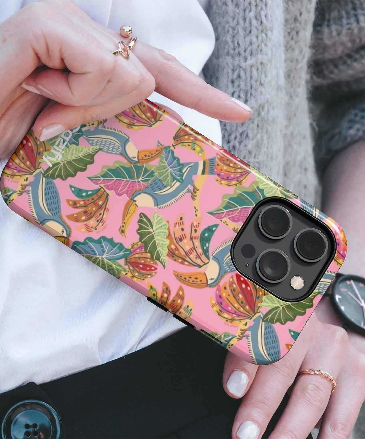 Pink iPhone case with colorful tropical leaf and flower pattern on black camera cutout. - Cazify Canada