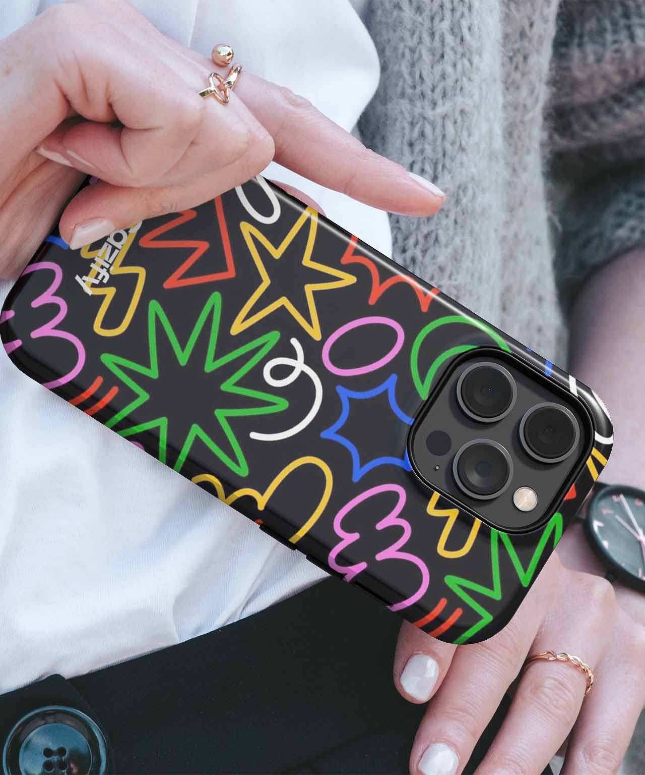 Black iPhone case with colorful neon-style stars and squiggles design. - Cazify Canada