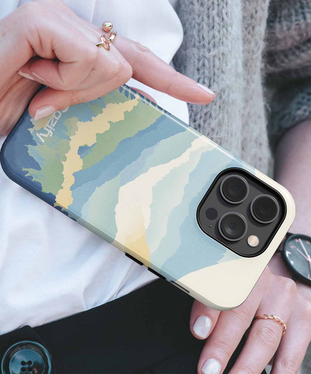 Cazify Canada - Cream and pastel blue abstract wave pattern phone case on iPhone with triple camera lenses.