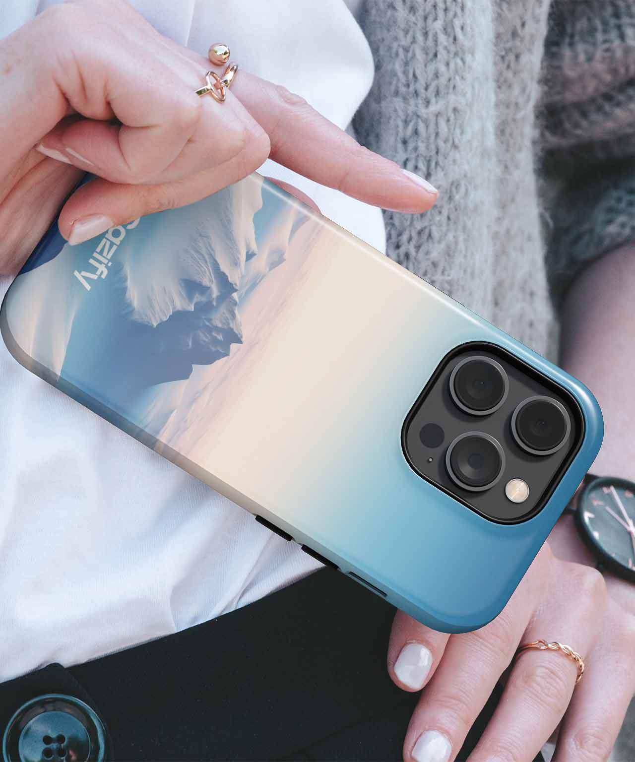 Cazify Canada - Blue gradient phone case with mountain and sky design on iPhone with triple camera lenses.