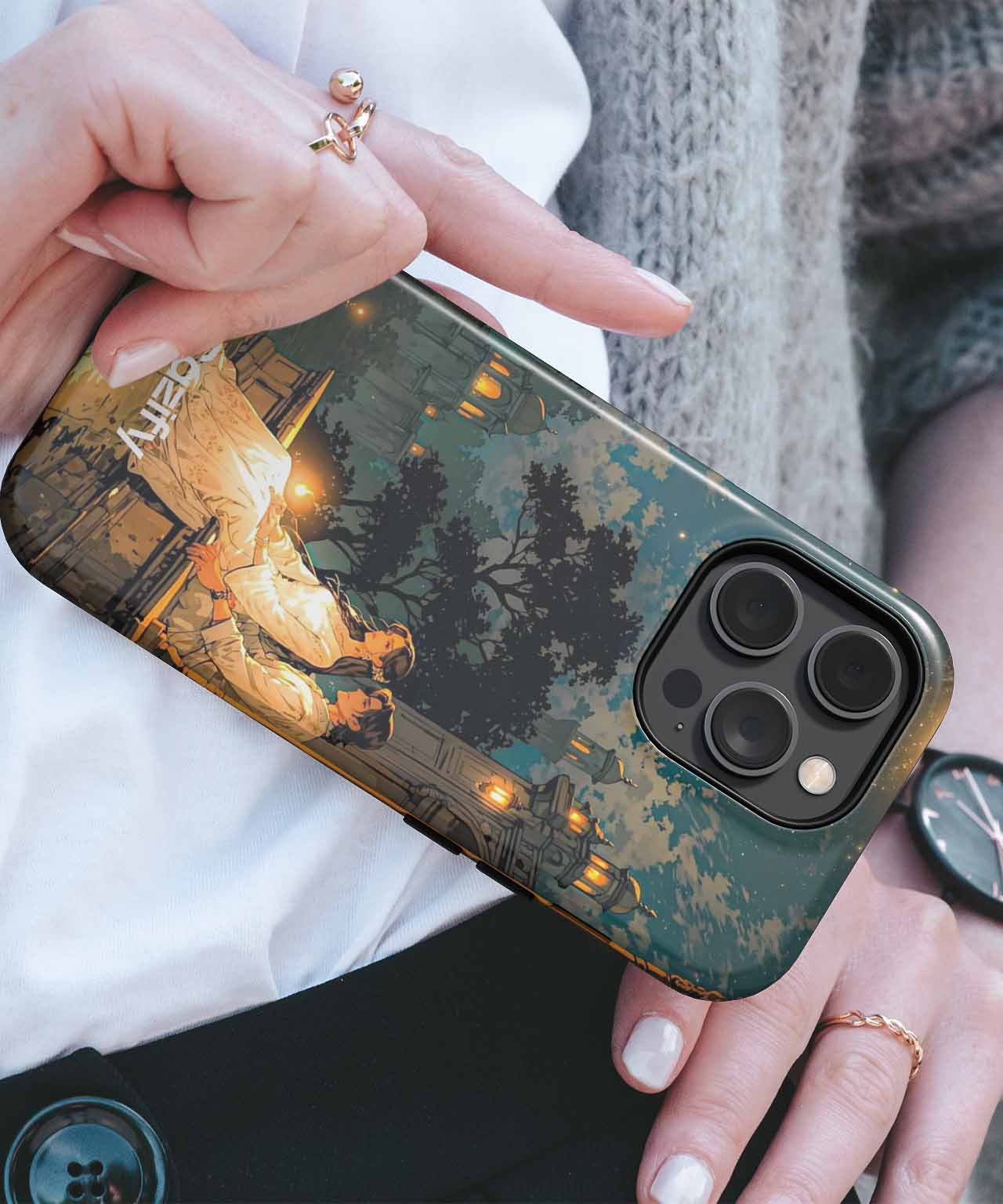 Black iPhone case with warm campfire illustration and forest background. - Cazify Canada