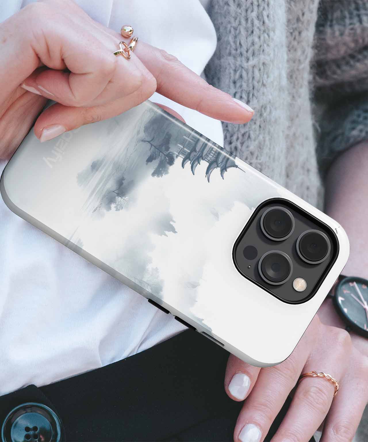 Cazify Canada - White iPhone case with black and gray watercolor cloud design and triple camera cutout.
