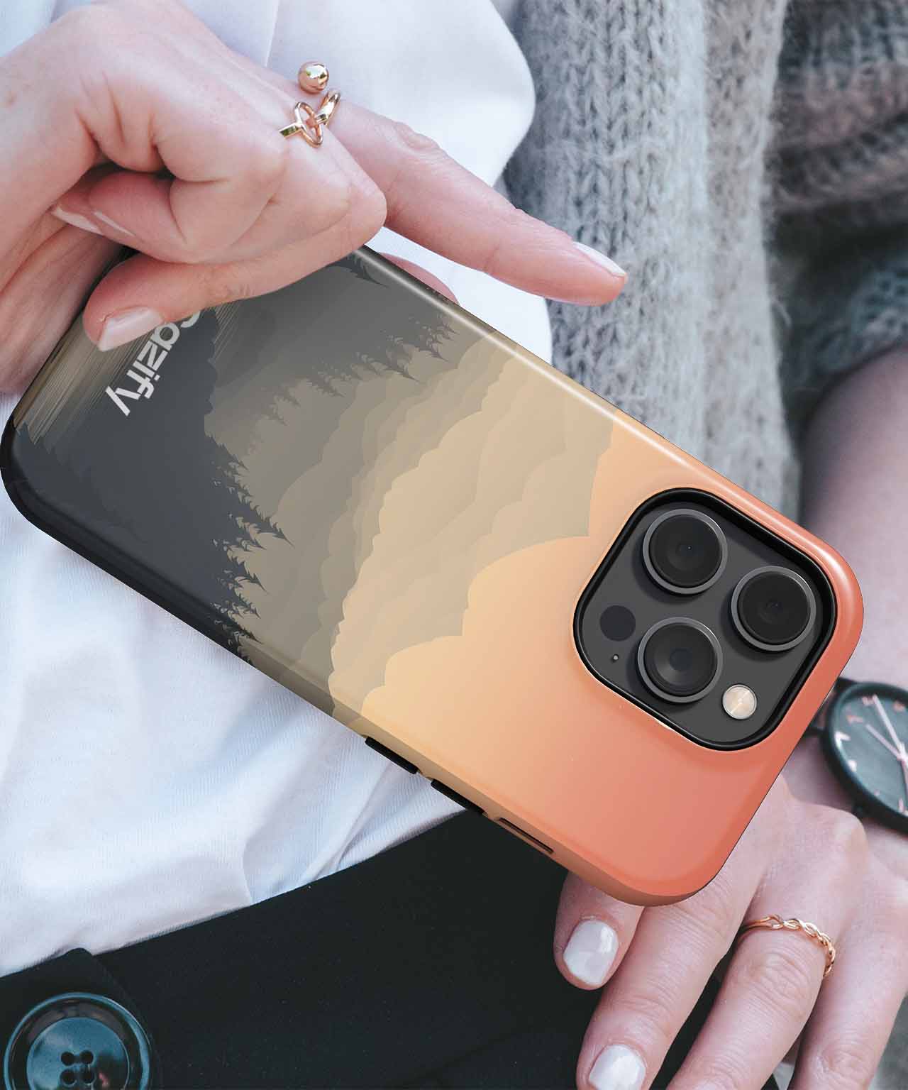 Cazify Canada - Glossy black and copper protective phone case with triple camera cutout on iPhone.