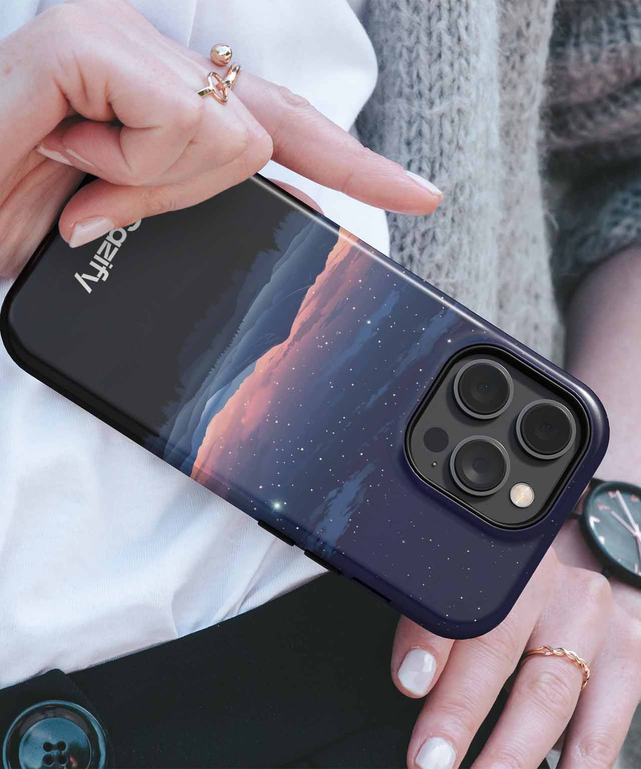 Cazify Canada - Black iPhone case with a glossy night sky and mountain design, triple camera cutout.