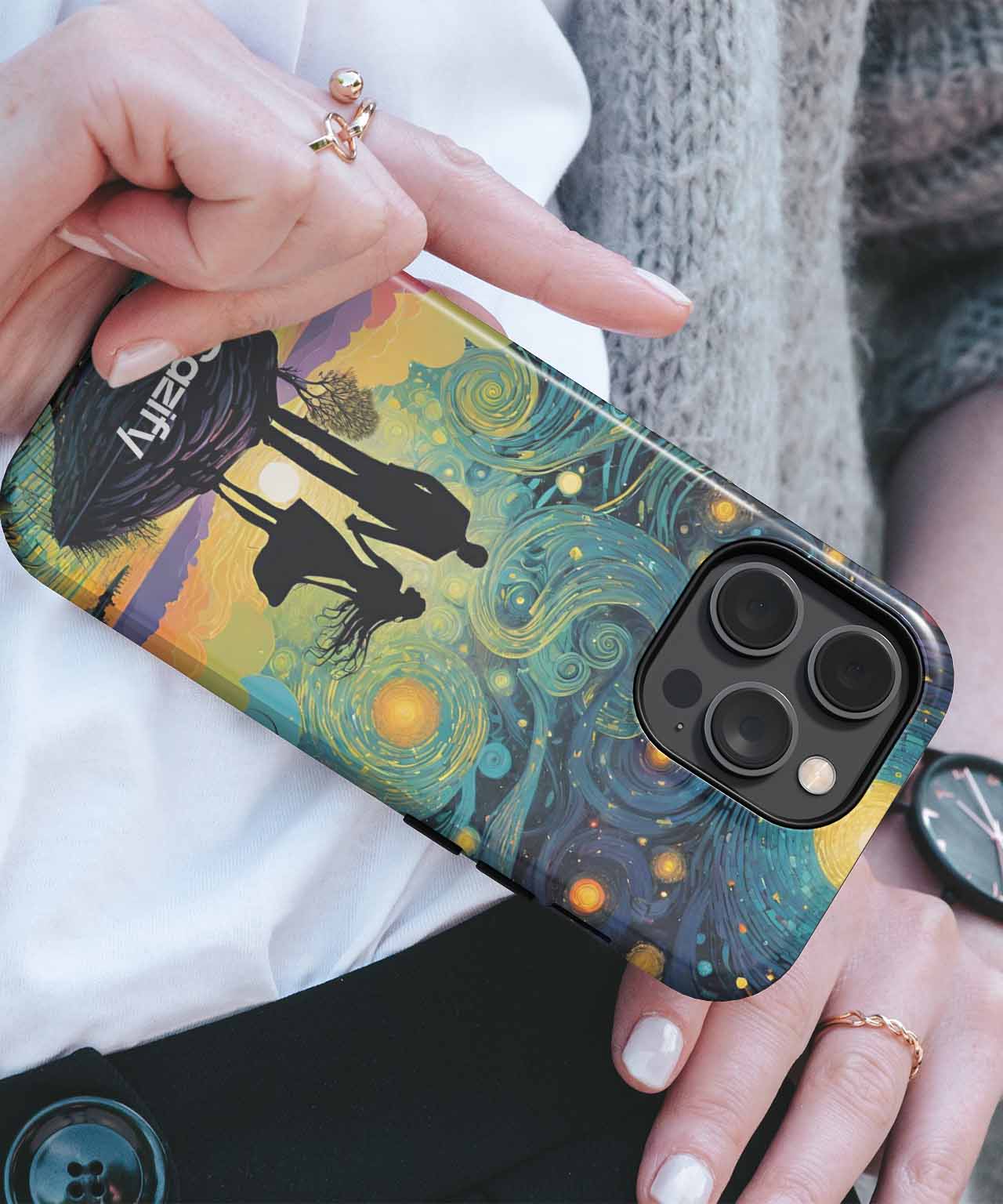 IPhone case with Starry Night Van Gogh artwork and silhouetted couple holding hands. - Cazify Canada