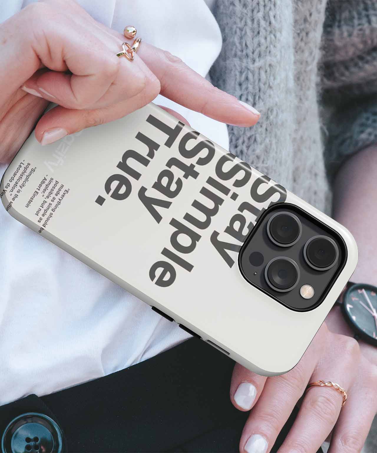 Cream-colored iPhone case with black "Stay simple stay true." text and triple camera cutout. - Cazify Canada
