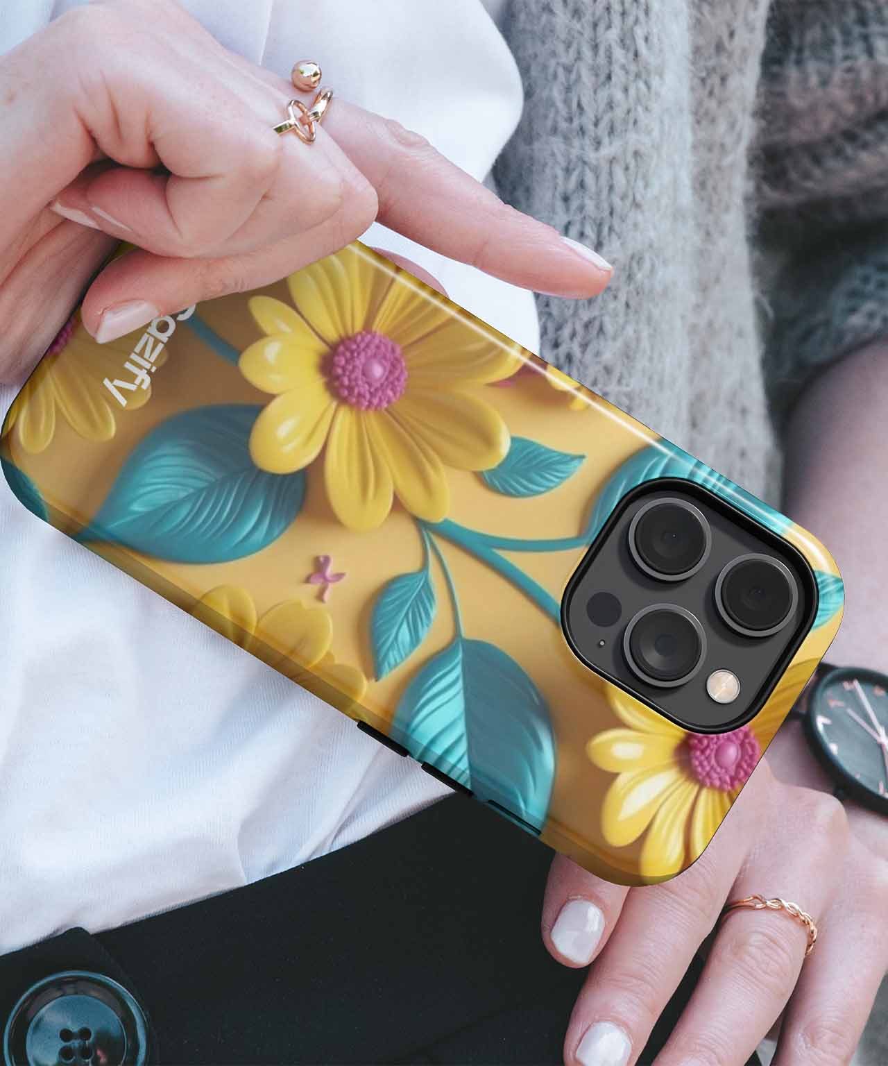Yellow sunflower floral patterned phone case on a gold iPhone with triple camera lenses. - Cazify Canada