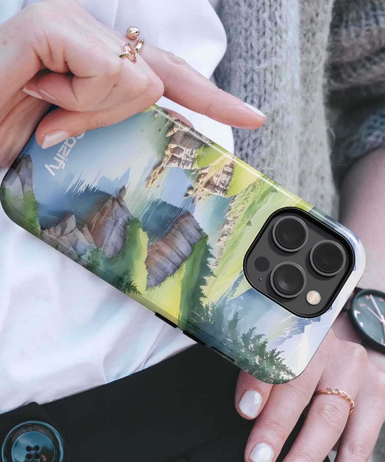 Cazify Canada - Clear phone case with a colorful scenic landscape design on a smartphone with triple camera lenses.