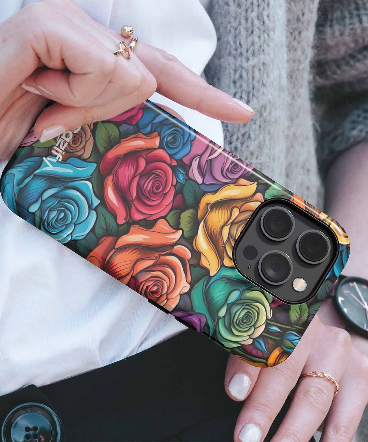 Colorful rose pattern iPhone case on black smartphone with triple camera lenses. - Vibrant Rainbow Garden of Roses iPhone case - Cazify Canada