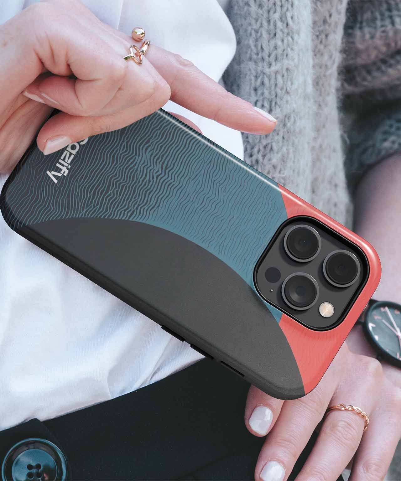 Protective iPhone case with black, blue, and red geometric design and triple camera cutout. - Cazify Canada