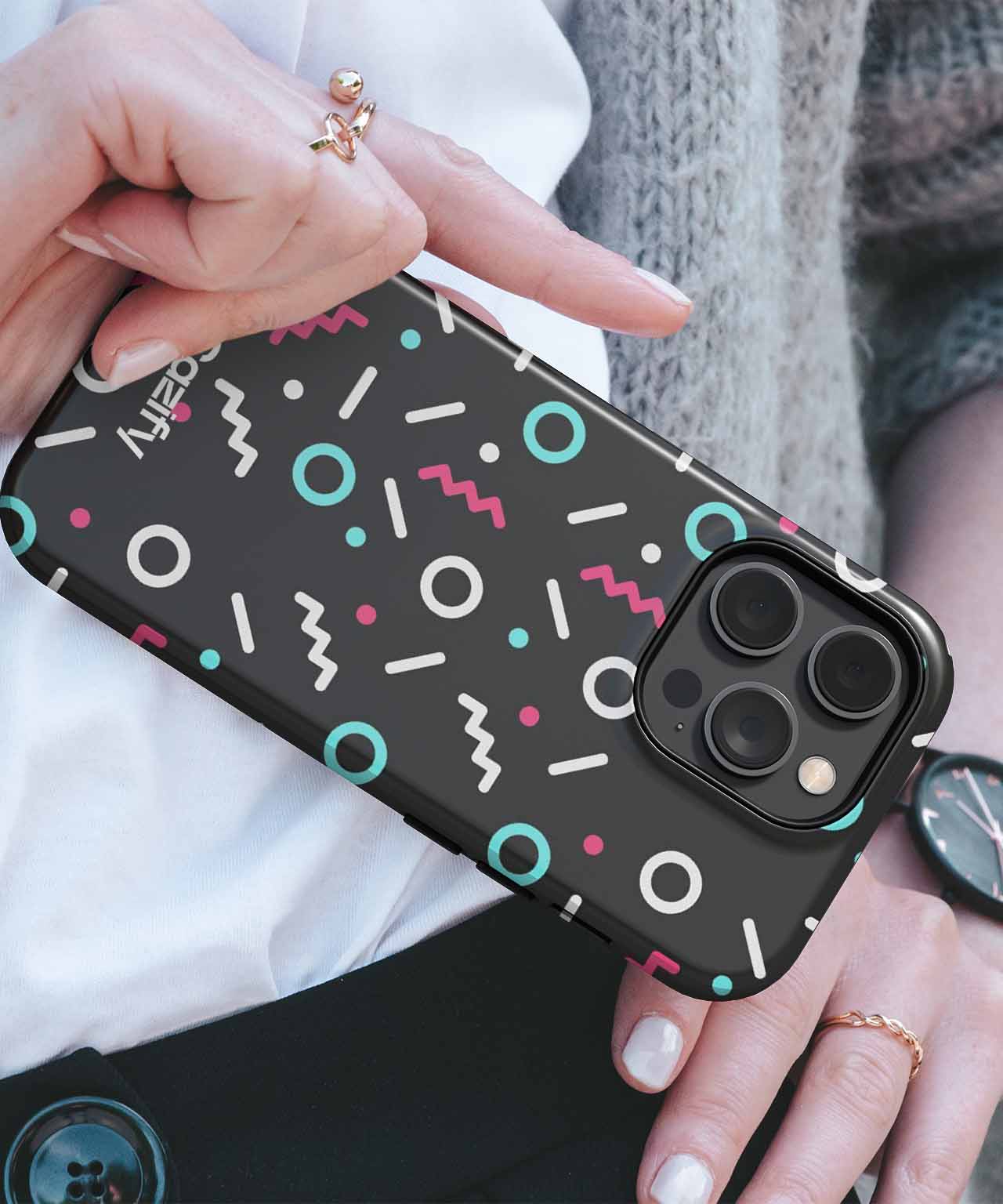 Black iPhone case with colorful abstract retro shapes and patterns. - Cazify Canada