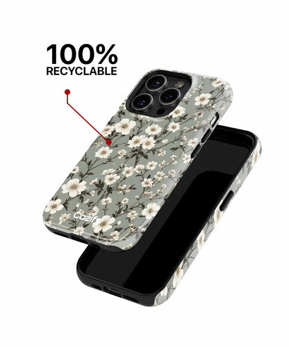 Floral patterned phone case with white flowers and green leaves for iPhone, 100% recyclable. - Cazify Canada