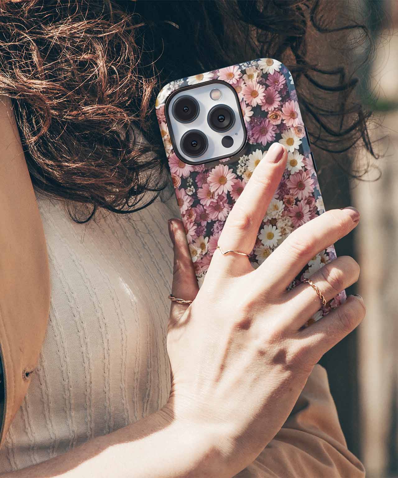 Floral-patterned iPhone case with pink, white, and purple flowers on a gold background. - Cazify Canada