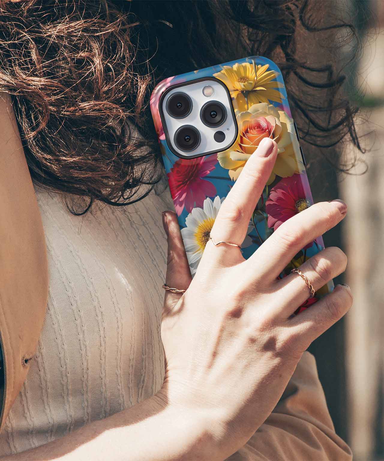 Floral patterned iPhone Case with daisies on a white iPhone held by a person. - Colorful Flower Party in Full Bloom iPhone case - Cazify Canada