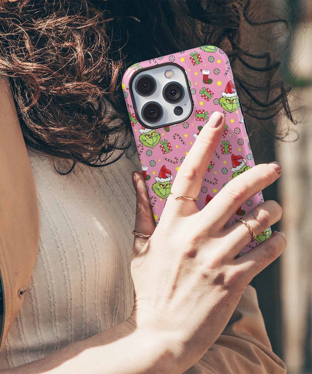 Grinchy Mischief on a Pink Christmas Background iPhone case Case Cazify - Delivery Canada