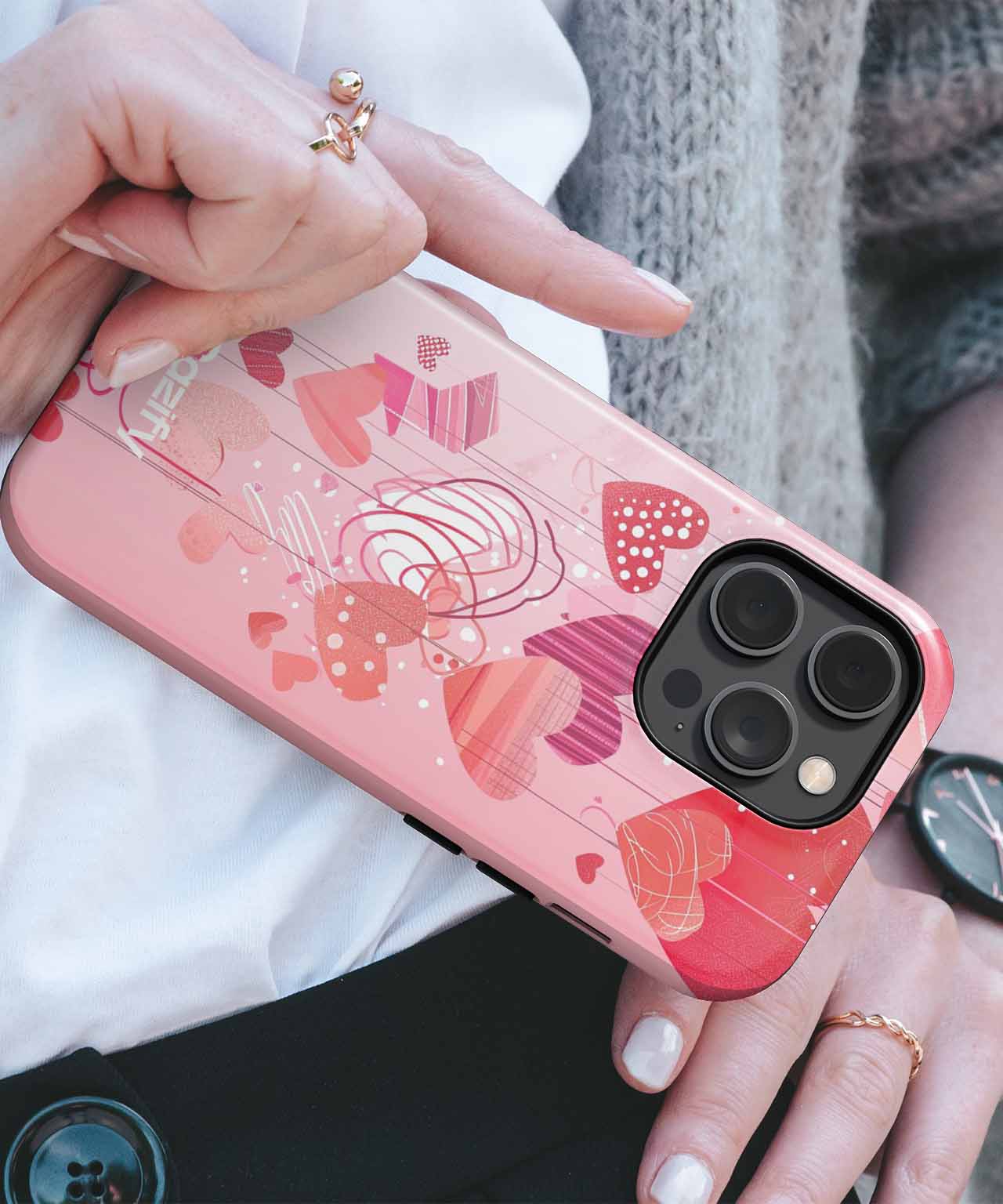 Pink iPhone case with red and pink heart and abstract designs, glossy finish, triple camera cutout. - Cazify Canada