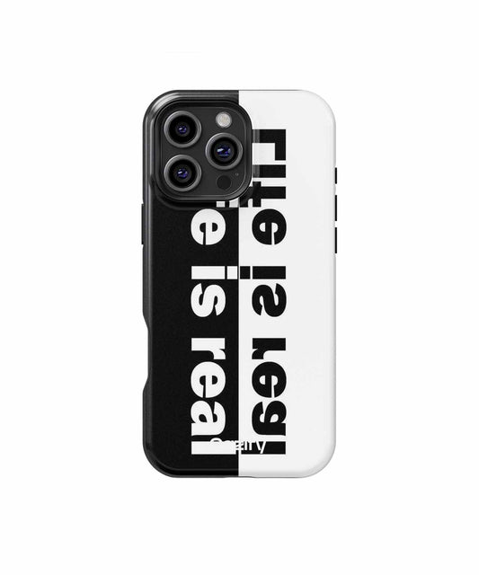 Black and white iPhone case with vertical "Life is real" text split across both colors. - Cazify Canada