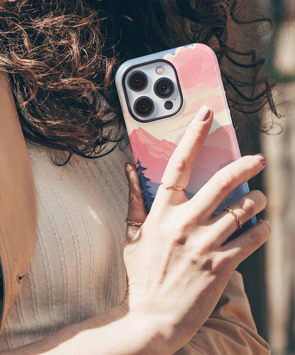Cazify Canada - Pink and purple abstract pattern iPhone case on a smartphone with triple camera lenses.