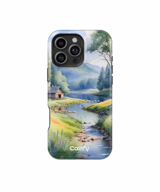 Cazify Canada - IPhone case with serene landscape featuring a river, cabin, and pine trees in soft colors.