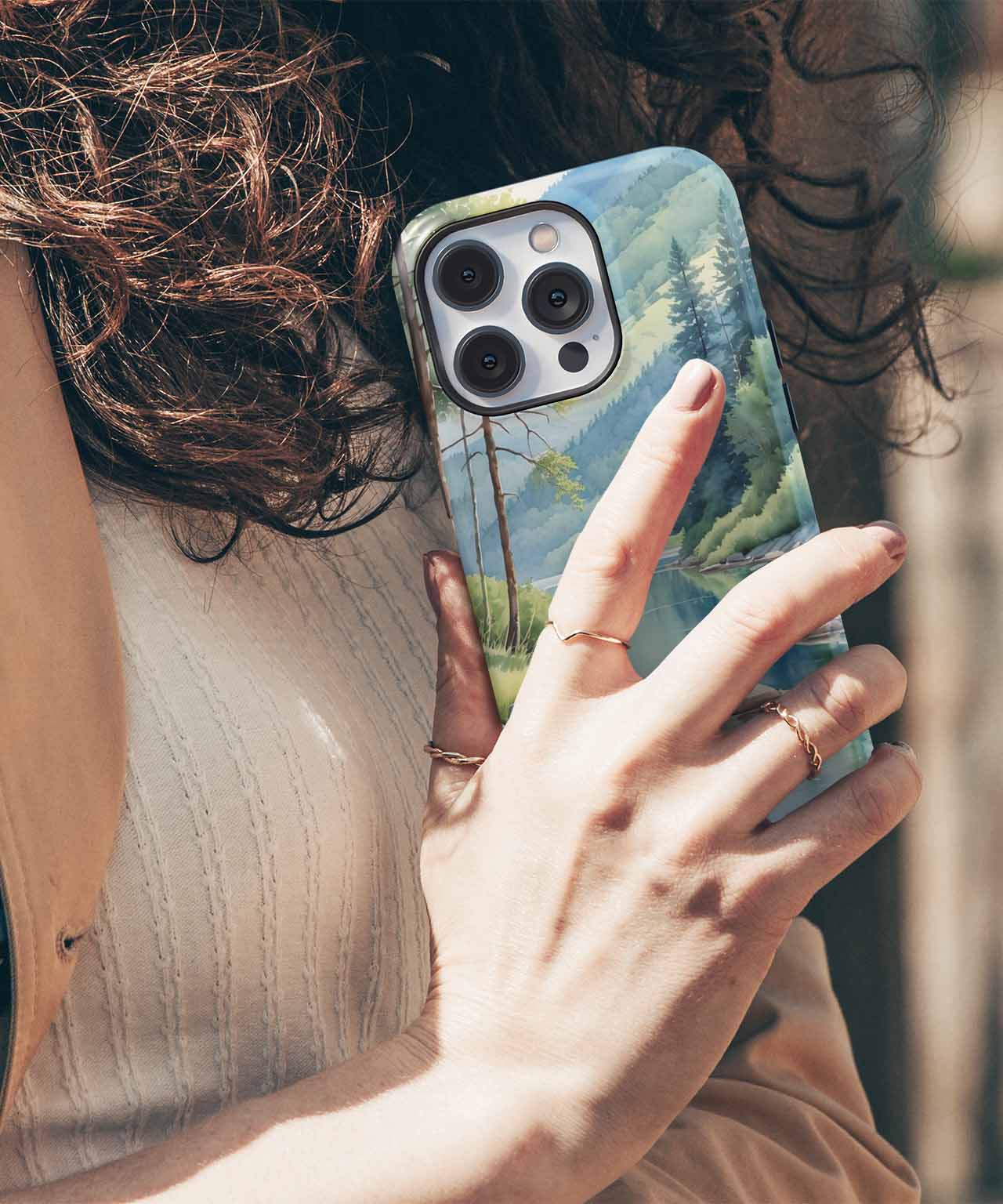 Cazify Canada - Glossy green and blue marble-patterned iPhone case with triple camera cutout.