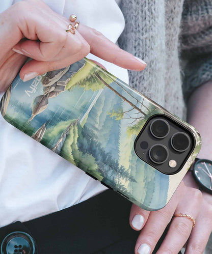Cazify Canada - Clear phone case featuring a scenic countryside landscape with a person riding a horse and green hills.